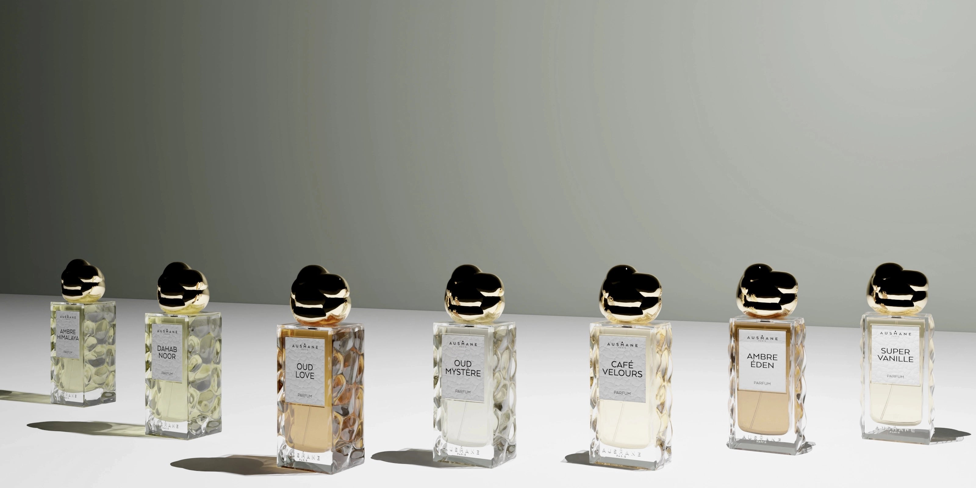 Bannière mobile des nouveautés Ausmane – Collection exclusive de parfums sur fond élégant et raffiné.