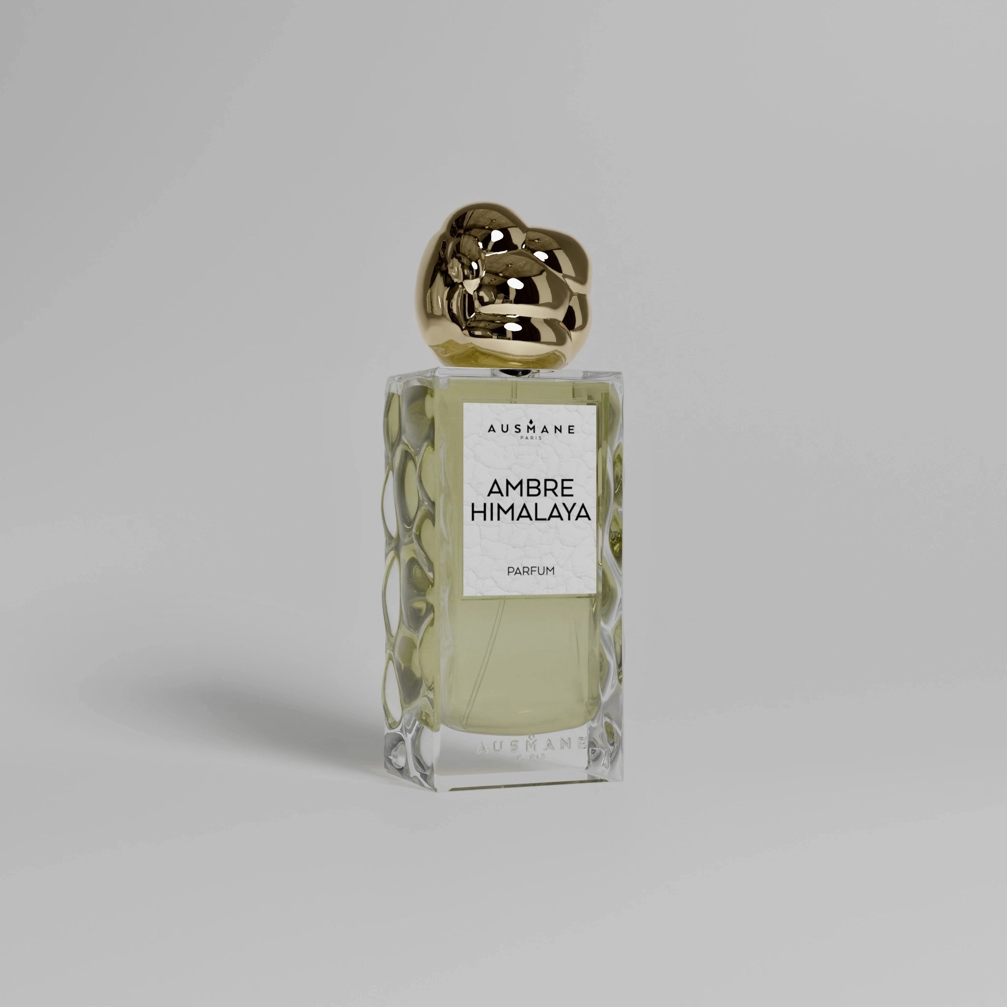 Flacon du parfum Ambre Himalaya de la Maison Ausmane – Une fragrance raffinée aux notes d’ambre, café et santal.